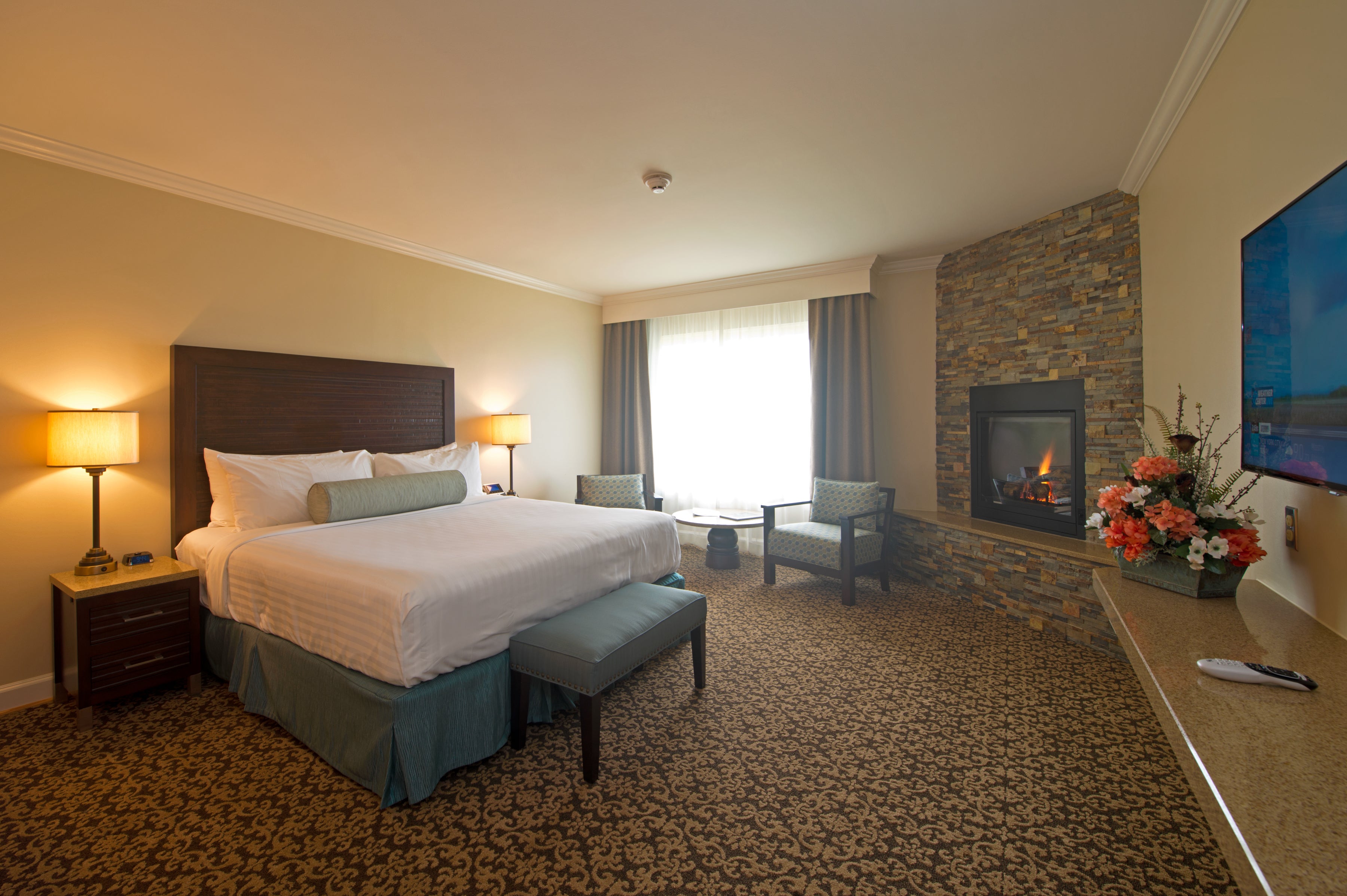 Room inside Queen Wilhelmina Sate park lodge with fireplace